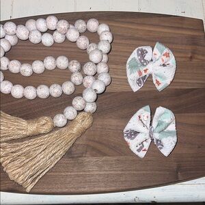 Light green background, snowman with trees, and grey ice cubes